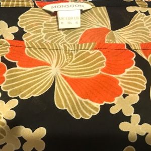 Monsoon black top with colorful flowers. Size us 4